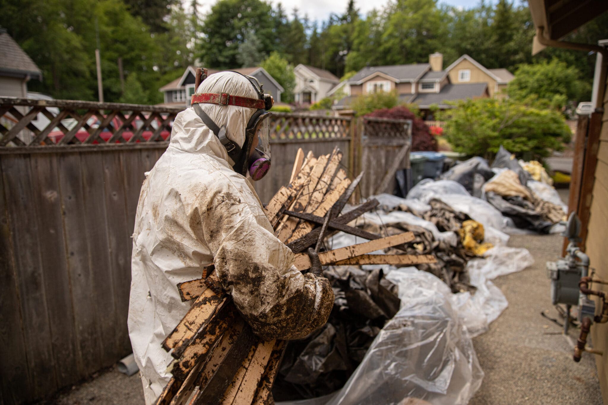 Crawl Pros professional performs crawl space cleanout from flooding and water damage.