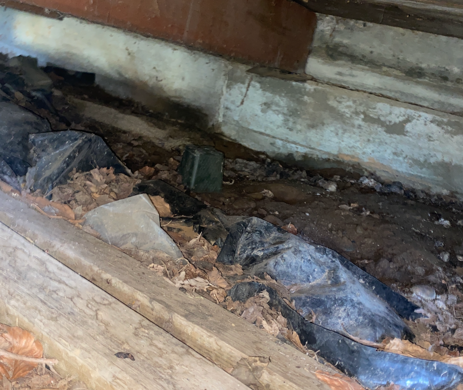 Crawl space in need of a crawl space cleanout