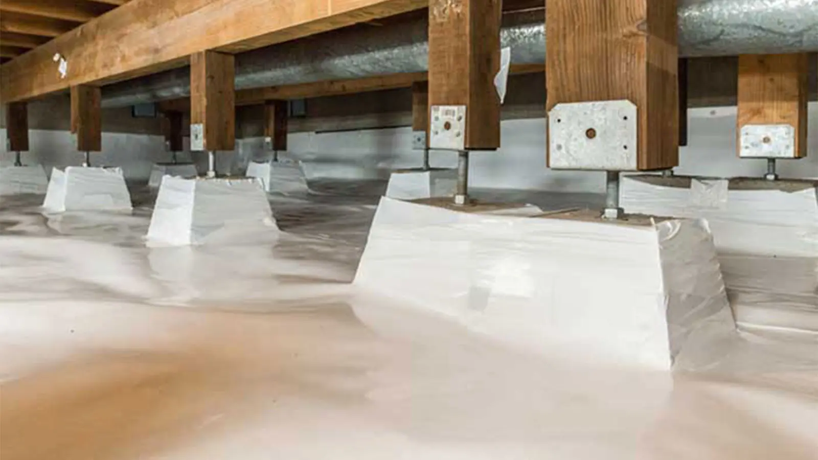 Vapor barrier encapsulation installed in a crawl space by Crawl Pros professionals